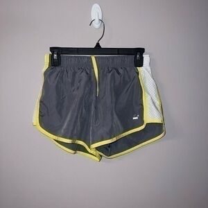 Gray yellow and white RBX running shorts Small